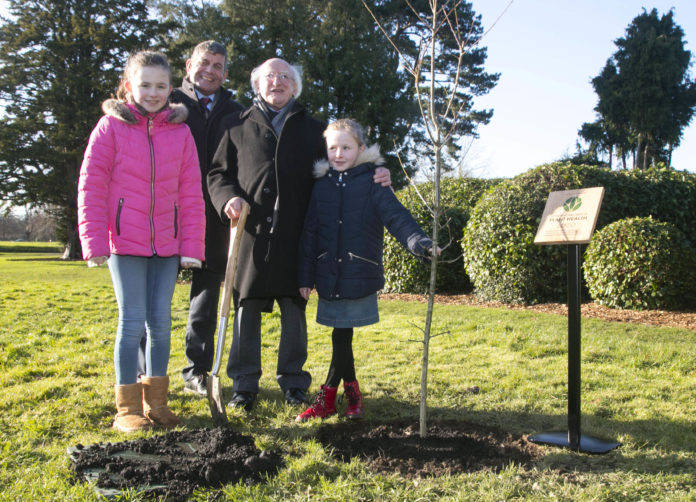 President of Ireland Michael D. Higgins planted a Native “Sessile Oak” tree in the Phoenix Park to commemorate Ireland’s launch of International Year of Plant Health 2020. Pictured with President Michael D. Higgins, are Andrew Doyle, Minister for State at the Department of Agriculture, Food and the Marine, with Molly Keenan aged 11, with her sister Rhona aged 7, both from Scoil Mhuire Na Trocaire, Ardee, Co. Louth. Picture Colm Mahady / Fennells - Copyright© Fennell Photography 2020